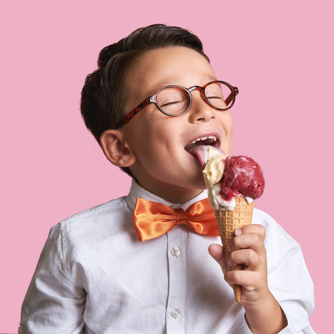 smiling boy eating ice cream