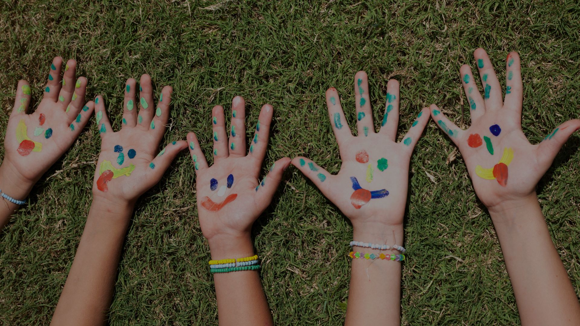 kid hands with paint on them