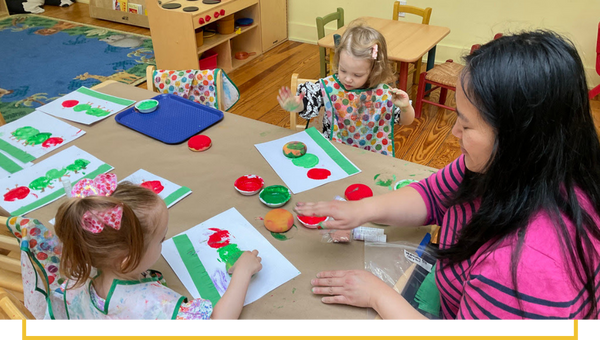 image of kids finger painting