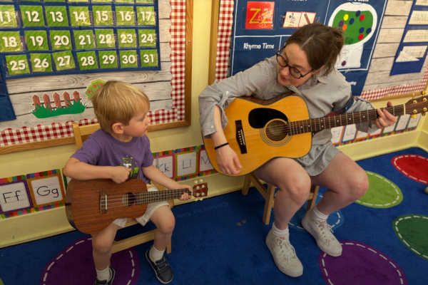 image of a teacher and a student